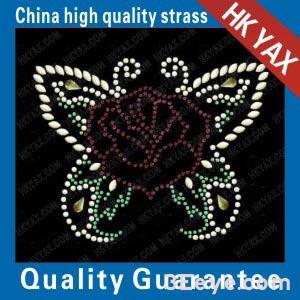 The intricate design of a butterfly's body is composed of various flowers design motifs of rhine stone hot fix
