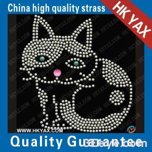 A cat crouching and sitting down, exhibiting an appeasing demeanor towards its owner design motifs of rhine stone hot fix